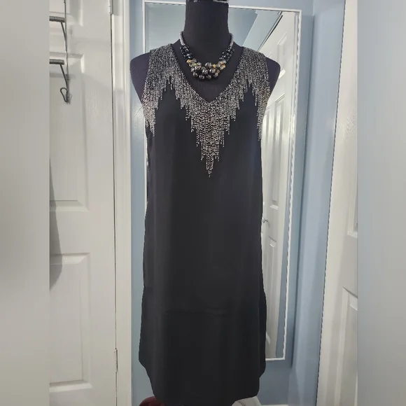 h and m beaded dress H & M black beaded dress. Size 8